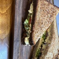 Toasted tomato, hummus and olive sandwich   at Zen Cafe in Mumbai