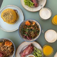 Fresh spring roll with peanut dipping sauce, vegetable fried rice, jack fruit burger, chai latte, fresh pressed ginger and carrot juice   at Monkey Mood in Bordeaux