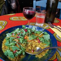 Indian Curry with lentils, sweet potatoes, rice etc. and a glass of wine 🤗😍 at Monkey Mood in Bordeaux