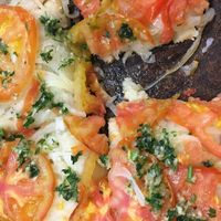 Pizza Fugazza at Pizzería Güerrín in Buenos Aires