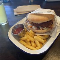 Cauliflower burger - only thing here I haven’t liked. Give me a gluten bun!   at Moon Under Water in Christchurch