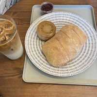 Iced soy latte, ciabatta bread with raspberry jam/butter, and cheesecake at For Four Bread 포포브레드 in Seoul