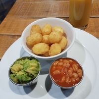 Selection of sides and orange juice. Tasty and less than a tenner. at MAN - The Grain Loft - T1 in Manchester