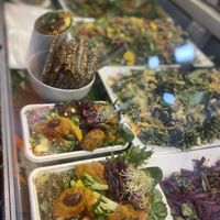 Salad options come in three sizes to dine in or takeaway at Snoogies Health Bar in Cairns