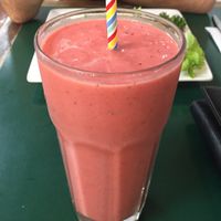 Mango, pineapple, papaya, dragonfruit and coconut cream smoothie! SO TASTY!  at Snoogies Health Bar in Cairns