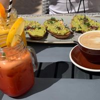 Avocado toast with coffee with milk, beetroot juice and fresh orange juice. at Abigail's Cafe in Lagos