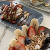 Acai bowl, pancakes and breakfast burrito  at Abigail's Cafe in Lagos