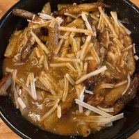 Poutine w/ Oven-Baked Fries & Mushroom Gravyy  at Copper Branch - Strandherd in Nepean