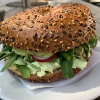 Avo breakfast bagel   at Iluzjon Café Bar in Warsaw