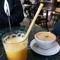Orange juice and coffee at Iluzjon Café Bar in Warsaw