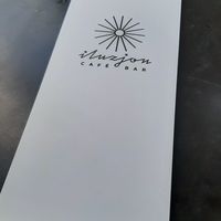 Iluzjon logo at Iluzjon Café Bar in Warsaw