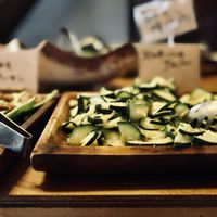 After we arrived and had explained our dietary choices, the staff kept bringing out new yummy vegan options. Like these tasty sautéed zucchini... at Ohara Riverside Cafe Kirin  in Kyoto