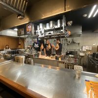 The kitchen at Menbaka Fire Ramen めん馬鹿 in Kyoto