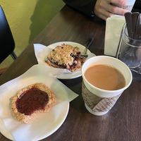 Jam cookie & berry/ oat bar, with coffee + oat milk  at The Black Bear - temporarily closed in Denali