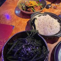 Tenderstem broccoli (bottom) and vegan chicken black bean dish (top)  at Tattu in Birmingham