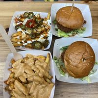 Chicken burgers, cheesy fries and spicy fries   at Herbivorous in Sheffield