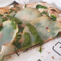 Wilted crust with raw potato slices on top...inedible...all 5 of us were disappointed at DEJ in Copenhagen