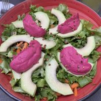 Fresh salad with avocado, carrots, lentils, beetroom hummus   at Gjelber in Tirana