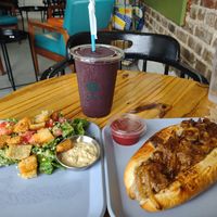 Vegan Philly cheese steak was disappointing. Vegan Caesar salad was great though as usual. Juice smoothie🥤, and service was also great as usual.  at Simple Cafe in Asheville