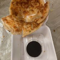 Scallion pancake with vinegar sauce to-go 350 at Han Noodle Bar in Rochester
