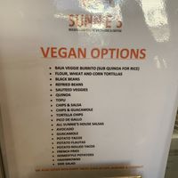 Was looking all over for vegan options - this is right by the register! Wish they’d ditch the chicken broth in the rice😡 at Sunnie's Ocean Beach in San Diego