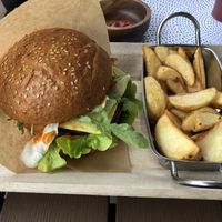 Beyond Meat burger with potato wedges  at Vegan Burger in Dornbirn
