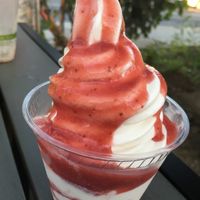 Soft serve with strawberry syrup  at Plant Power Fast Food in Long Beach