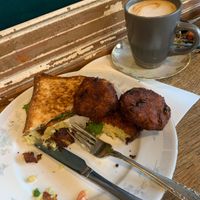 Half devoured vegan toastie and hash browns   at Samuel Pepys Cafe in Launceston