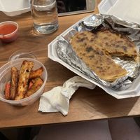 Yucca fries and 2 pupusas (vegan carnitas and vegan soyrizo). Went back for more yucca fries the next day!!  at Monse's Pupuseria in Colorado Springs