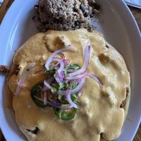 The avalanche with vegan queso and soyrizo on a potato and mushroom pupusa   at Monse's Pupuseria in Colorado Springs
