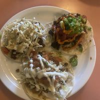 Three tacos- merlin, Felix Jasper and Leona Gayle. All so flavorful 🤤   at The Burrow in Vancouver