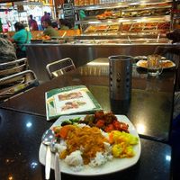 take some rice and put everything on it :) at Vinny Jeyaa Banana Leaf Curry House in Kuala Lumpur