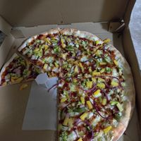 Large pizza w/ BBQ sauce base, onion, pineapple, broccoli, and roasted garlic at Pizza Jerks in Lake George