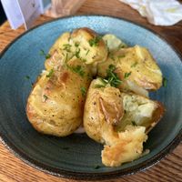 Smashed potatoes with garlic aioli   at Friend at Hand in London