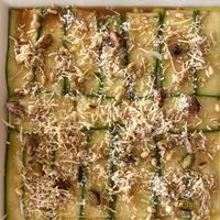 Zucchini carpaccio with toasted pistachios and pine nuts with a bright vinegar  at Dalmatino in Hvar