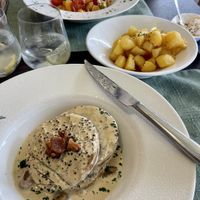Full meal. Gnocchi, fried potatoes and peppercorn sauce covered seitan steak.  at Dalmatino in Hvar