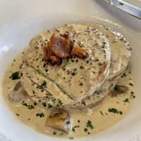 Close up of the vegan seitan steak covered in peppercorn sauce and mushrooms (I started trying to eat it too quickly, hence the knife marks)  at Dalmatino in Hvar