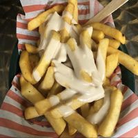 Yummy chips and tahini sauce  at Mr Falafel in West London