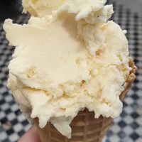 Pineapple and passion fruit ice cream on a cone (the cones are vegan too!) at Nutwood in Ericeira