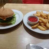 Avocado burger and fries at Veganland in Prague