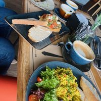 Tofu scramble, hummus with vegetables, stuffed eggplant at Black Rabbit in Chisinau