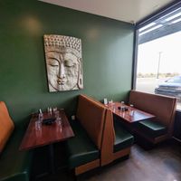 No outside seating but plenty of booths. at Coriander in Denver
