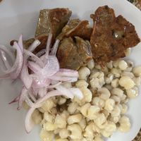 Chicharron con mote   at Restaurant Vegetariano Mais in Trujillo