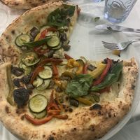 The vegetarian pizza without mozzarella, the only thing they could offer 04.2022  at La Locanda Del Grifo in Naples