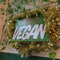 Vegan signs   at Monstera Canteen in Luton