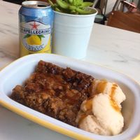 Bread and Butter Pudding with Vanilla Ice Cream  at Monstera Canteen in Luton