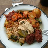 Buffet plate with tofu stew, falafel, salads and dips at Sandro in Helsinki