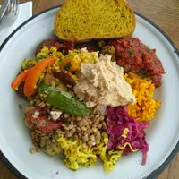 Lunch buffet plate with falafel, selection of salads and dips at Sandro in Helsinki
