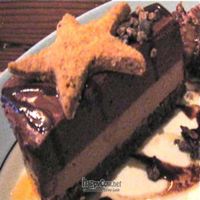 Too too too! Chocolate Rosemary Torte w/cocoa-cashew mousse, dark chocolate ganache & salted caramel, topped with a pecan-barley cookie. at Portobello Vegan Trattoria in Portland