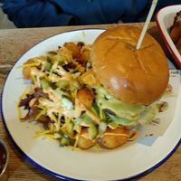 Baconator with loaded tater tots at Mighty Wieners  in Bournemouth